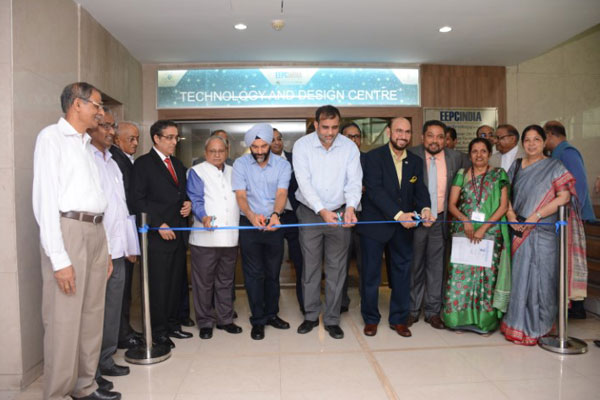Ribbon Cutting as a mark of inauguration by Dr Anup Wadhawan, Commerce Secretary, MOC&I, GOI (4th from left); Mr B S Bhalla, Additional Secretary, DOC, MOC&I, GOI (3rd from left ). Mr Ravi Sehgal, Chairman, EEPC India (5th from left). Mr Mahesh K Desai, Sr Vice Chairman, EEPC India (2nd from left) ; Mr Arun Kumar Garodia , Vice Chairman, EEPC India (far left); Mr Bhaskar Sarkar, Advisor, EEPC India Technology Centre (to the left of Mr Sehgal).
